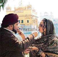 Rishi Kapoor and Rekha shoot for the Hindi feature film, Sadiyaan, at the Golden Temple in Amritsar on Tuesday. 