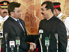 Pakistan President Pervez Musharraf (L) shakes hands with Syed Yousaf Raza Gilani after the latter was sworn in as the Prime Minister at the President House in Islamabad on Tuesday.
