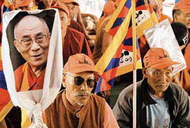Tibetans carry the Dalai Lama's portrait during a protest march in Chandigarh on Wednesday. 