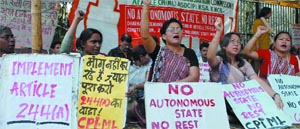 Activists of CPI(ML) and Karbi Students Association agitate for autonomous status for Karbi Anglong and North Cachar Hills districts of Assam, at Jantar Mantar in the Capital on Wednesday. 