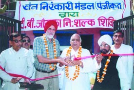 Surinder Singh, Delhi Municipal Councillor, inaugurates a health check-up camp at Jagatpur in North-East Delhi organised by the Sant Nirankari Mission on World TB Eradication Day on Monday.