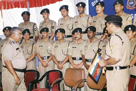 BSF Director-General A.K. Mitra (left) with members of the BSF mountaineering team to Mount Kanchenjunga, in New Delhi on Wednesday.