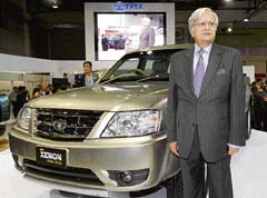 Ravi Kant, managing director of Tata Motors, poses next to the company's new pickup truck model "Xenon" at the 29th Bangkok International Motor Show in Bangkok on Thursday.