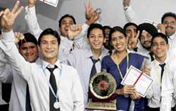 Jovial students of CIHM display trophy and commendation certificates during the annual day