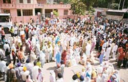 People protesting in Jammu on Thursday, demanding action against the accused for the murder of Harminder Singh