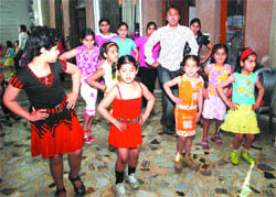 Kids take a dance class at a spring camp in the Vivek Aggarwal Dance Academy.