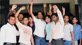 Students of Arya College protest against college authorities for not issuing their roll numbers in Ludhiana on Thursday. Photo: I.V.