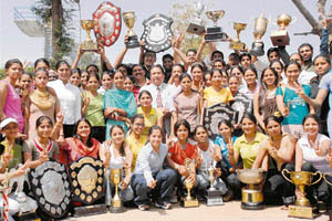 Winners in jubiliant mood after the Panjab University annual sports prize distribution function in Chandigarh on Friday.