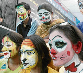 Students during a face-painting compitition at the PSMS Fest at Punjabi University in Patiala on Friday.