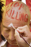 One of the Tibetans who got his head shaved at Shimla on Friday as part of the ongoing protest against the killings in Lhasa by the Chinese army.