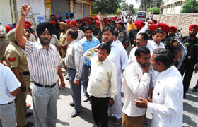 Activists of several organisations protesting at the Bhagu Road in Bathinda on Saturday