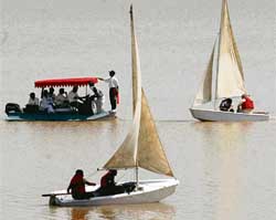 Participants try to slog it out during the 2nd Punjab Open Yachting Championship at Sukhna Lake in Chandigarh