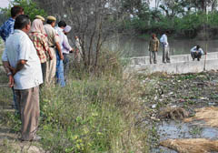 Villagers and the police make efforts to locate bodies in the Bhakra Canal near Kachwa village on Saturday. 