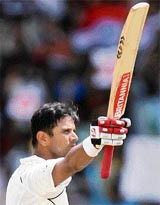Rahul Dravid celebrates his 10,000th career run during the fourth day of the first Test  against South Africa in Chennai on Saturday.