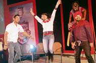 Preity Zinta jumps with joy while Yuvraj and Daler Mehndi look on during the launch of the teams anthem