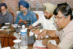 Former member of the Planning Commission, Prof Arjun K Sengupta, delivers a talk at the Center for Research in Rural and Industrial Development in Chandigarh