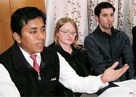 Ngawang Yonten (extreme left), vice-president of the Shimla Tibetan Solidarity Committee and Australian travellers Esther O'Brien and Wade Collins share their experiences of a recent visit to Tibet at a press conference in Shimla