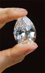 A pear-shaped D-colour flawless 72.22 carat diamond is shown during a press preview at Sotheby's Auction House in Hong Kong on Monday. The diamond worth an estimated $ 10-13 million will be offered at auction by Sotheby's on April 8