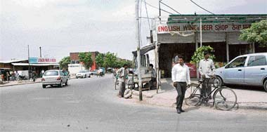 Two liquor vends at the trijunction of roads in Sector 48 of Chandigarh