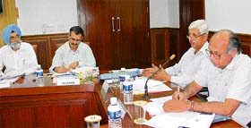 Haryana chief secretary Dharam Vir (extreme right) presides over a meeting to discuss the Delhi-Mumbai Industrial corridor project with Ajay Dua, adviser to the department of industrial promotion and policy of the union government