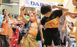 Autistic children perform at a function at Darpan to mark World Autism Awareness Day in Ludhiana