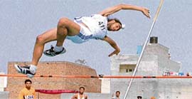 an athlete takes part in the pole vault event during the 37th Annual State-Level Inter-Polytechnic Athletics Meet in Ludhiana 