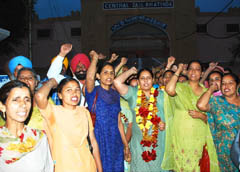 Members of the Anganwari Workers Union raising anti-government slogans after being released from the Central Jail in Bathinda on Thursday.