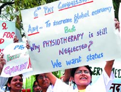 AIIMS physiotherapists shout slogans against the Sixth Pay Commission for giving them a raw deal, at Jantar Mantar in the Capital 