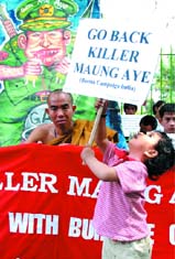 Prodemocracy Burmese activists burn an effigy of Mynmar senior vice general Maung Aye on his visit to India, at Jantar Mantar in the Capital