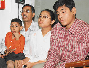 Ranjan Kumar and his three children, who have been pushed out of their house allegedly by his wife in Ludhiana. 