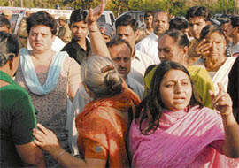 Residents of Sectors 8 and 9 protest against the opening of a liquor vend near their locality in Panchkula on Saturday.