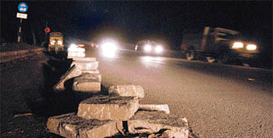 Concrete slabs of the dug-up section of road dividing Sector 19 and 20 in Chandigarh on Sunday posing a grave threat to motorist particularly during night hours due to non-functional streetlights.