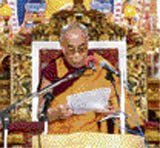 The Dalai Lama addresses the gathering at the International Prayer Day in McLeodganj on Sunday.