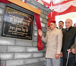 Chief Minister P.K. Dhumal inaugurates a sewerage scheme at Jogindernagar on Saturday.