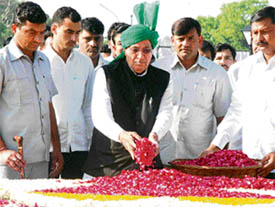 INLD president Om Prakash Chautala pays tributes to his father Devi Lal on his death anniversary at his samadhi in New Delhi on Sunday.