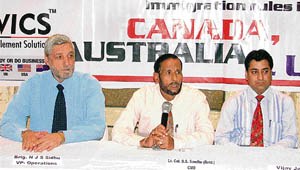 Officials from the WWICS unveil new rules for Canadian immigration during a press meet in Ludhiana on Sunday. 