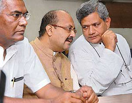 CPI leader D. Raja, UNPA leader Amar Singh and CPMs Sitaram Yechuri at a joint press conference in New Delhi on Sunday to announce nationwide protest against price rise from April 16.
