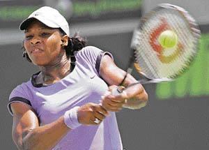 Serena Williams returns to Jelena Jankovic during the finals match at the Sony Ericsson Open tennis tournament in Key Biscayne, Fla., Saturday. Williams won 6-1, 5-7, 6-3.