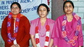 Three women computer teachers before they started an indefinite fast at Gandhi Chowk in Hamirpur on Monday.