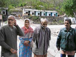 Hapless elderly migrants at the Talwara camp waiting for divine intervention to survive.