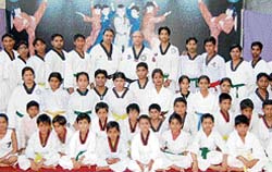Trainees of the Rose Rock Taekwondo Training Centre with Satwinder Vohra in Ludhiana