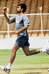 Munaf Patel bowls during practice session at Sardar Patel Stadium in Ahmedabad on Monday ahead of the third Test against South Africa scheduled to begin on April 11.