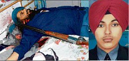 Bhupinder Singh, head constable with DIG (Home Gaurd), Punjab, who shoots himself after killing his wife and son at his residence in Kharar on Tuesday; (right) Robin Singh, who was also shot dead.