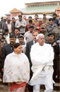 Union railway minister Lalu Prasad Yadav along with his wife and former Bihar chief minister Rabri Devi at the Nowgam railway station in Budgam in Srinagar