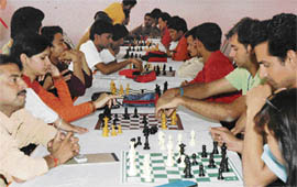 Players in action during the national chess championship of deaf at Samiti Kendra, Ludhiana, on Tuesday.