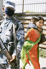 Nepalese riot police patrol in Kathmandu
