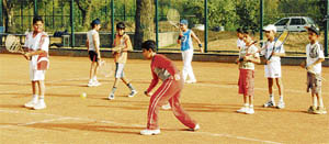 Budding tennis players hone their skills at the newly set up tennis center in Sector 42, Chandigarh.