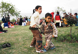 Children make merry in Badaam Wari in Srinagar on Wednesday.