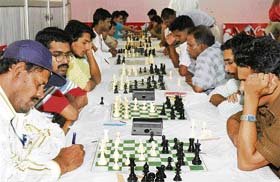 Players plan their next move during the fourth national chess championship for the blind at Samiti Kendra in Ludhiana