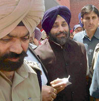 Sukhbir Singh Badal coming out of a court in Mohali on Wednesday. 